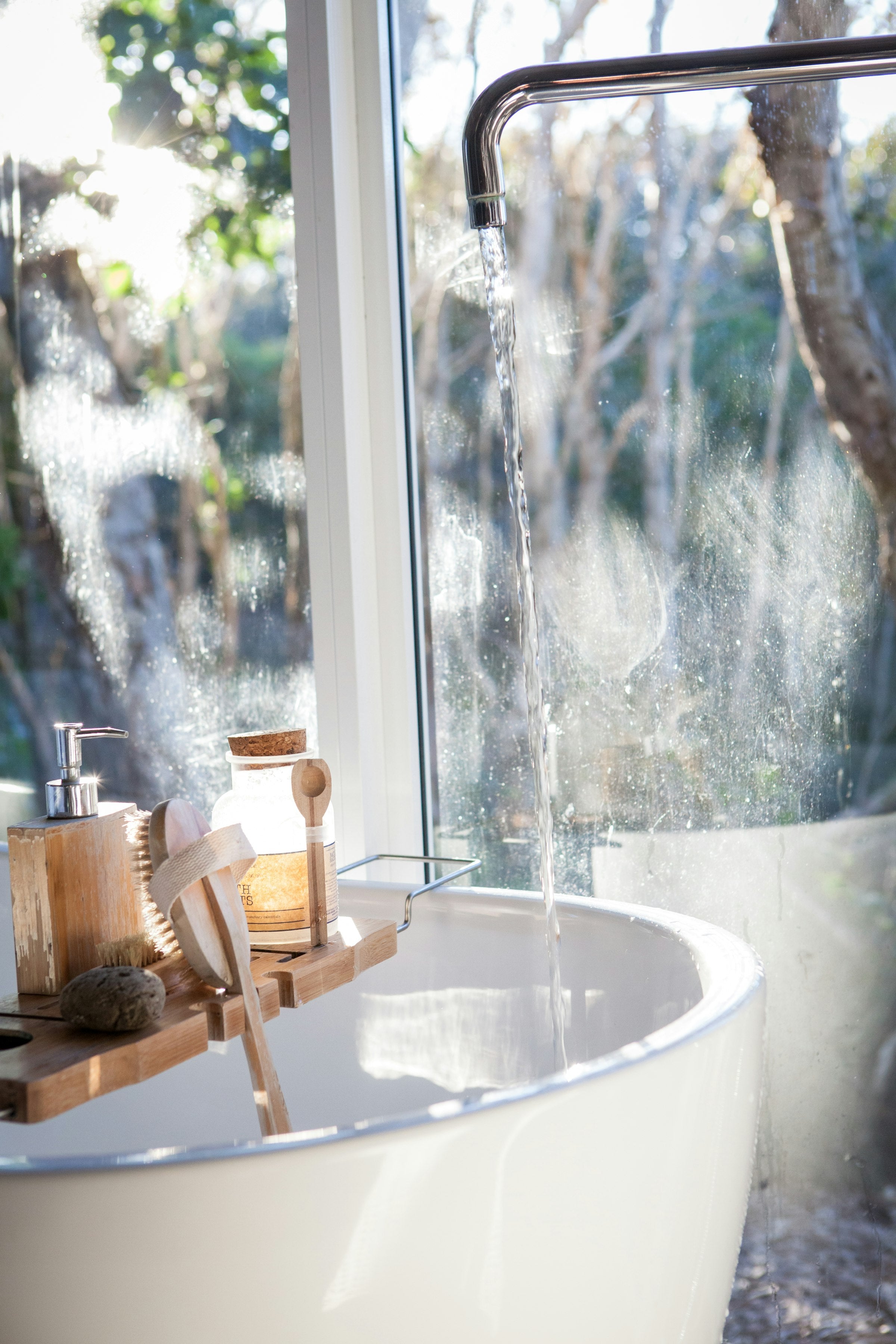 A guest resting in a warm bath